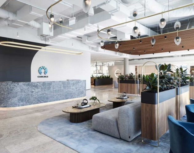 Reception area full of plants in a corporate environment