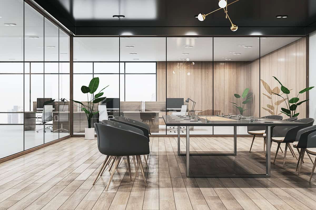 Clean wooden, concrete and glass meeting room interior with furniture and partitions. Workplace concept. 3D Rendering